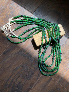 GREEN GLASS TRADE BEADS