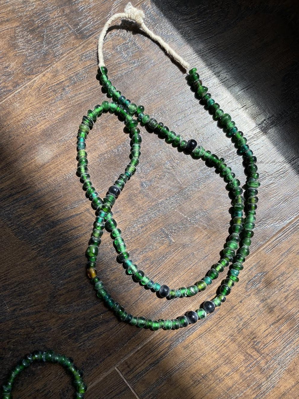 GREEN GLASS TRADE BEADS