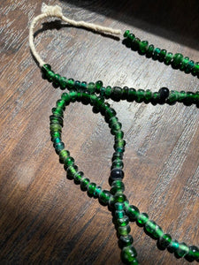 GREEN GLASS TRADE BEADS